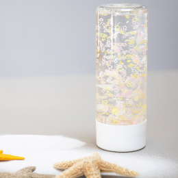 Bouteille sensorielle Coquillages jaunes Atelier Gigogne